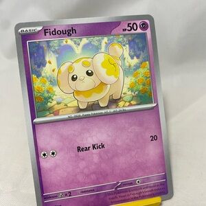 Fidough 038/091 Pokemon Sv: Paldean Fates Non Holo